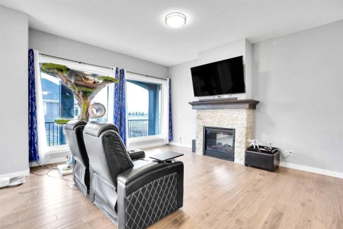 3 Muirfield Close, Lyalta, AB - Indoor Photo Showing Living Room With Fireplace