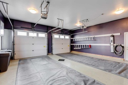 7 Filbert Close, Sylvan Lake, AB - Indoor Photo Showing Garage