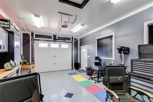 7 Filbert Close, Sylvan Lake, AB - Indoor Photo Showing Garage