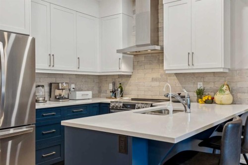 132 Crestridge Common Sw, Calgary, AB - Indoor Photo Showing Kitchen With Double Sink With Upgraded Kitchen