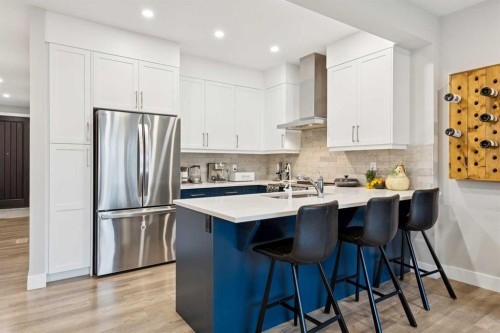 132 Crestridge Common Sw, Calgary, AB - Indoor Photo Showing Kitchen With Upgraded Kitchen