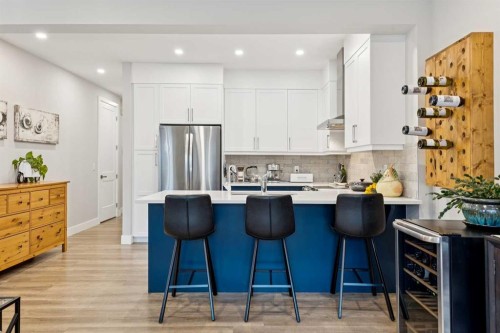 132 Crestridge Common Sw, Calgary, AB - Indoor Photo Showing Kitchen With Upgraded Kitchen