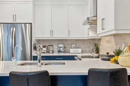 132 Crestridge Common Sw, Calgary, AB - Indoor Photo Showing Kitchen With Double Sink