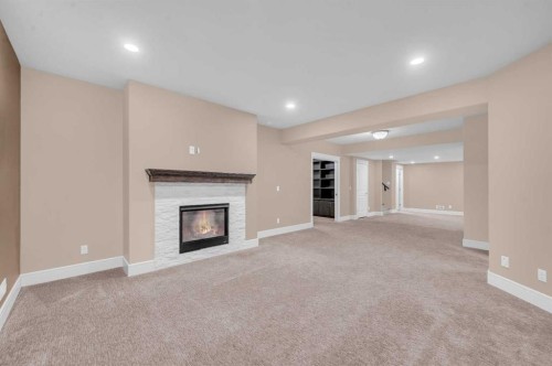 248 Marquis Landing Se, Calgary, AB - Indoor With Fireplace