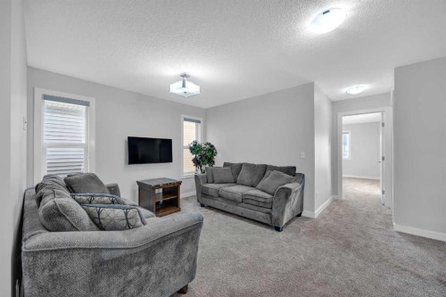 320 Nolancrest Circle Nw, Calgary, AB - Indoor Photo Showing Living Room With Fireplace