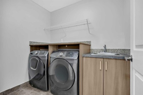 320 Nolancrest Circle Nw, Calgary, AB - Indoor Photo Showing Laundry Room
