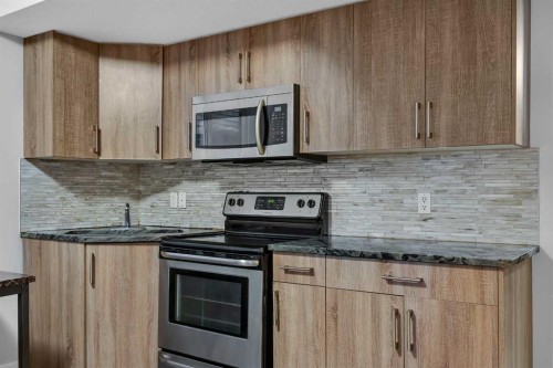 320 Nolancrest Circle Nw, Calgary, AB - Indoor Photo Showing Kitchen With Upgraded Kitchen