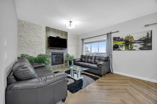 320 Nolancrest Circle Nw, Calgary, AB - Indoor Photo Showing Living Room With Fireplace