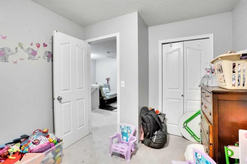 1004-720 Willowbrook Road Nw, Airdrie, AB - Indoor Photo Showing Other Room