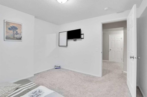 1004-720 Willowbrook Road Nw, Airdrie, AB - Indoor Photo Showing Other Room