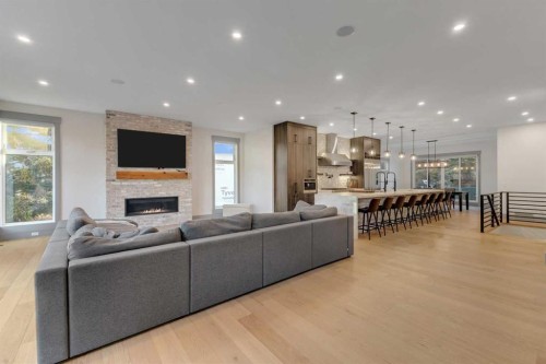 30 Roselawn Crescent Nw, Calgary, AB - Indoor Photo Showing Living Room With Fireplace