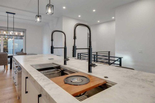 30 Roselawn Crescent Nw, Calgary, AB - Indoor Photo Showing Kitchen With Double Sink