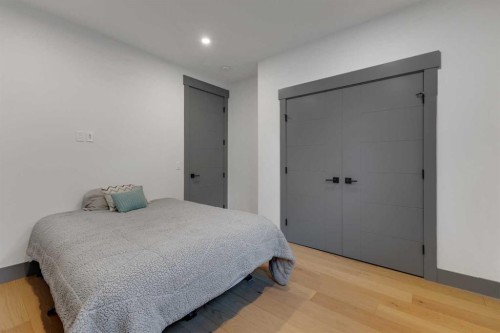 30 Roselawn Crescent Nw, Calgary, AB - Indoor Photo Showing Bedroom