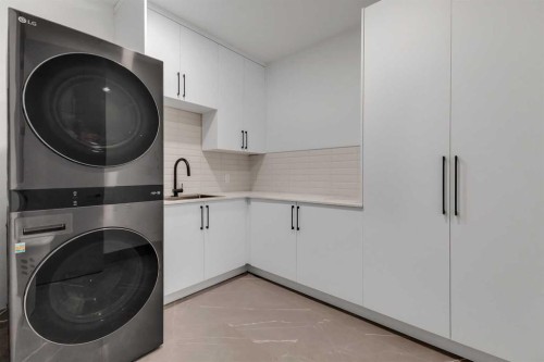 30 Roselawn Crescent Nw, Calgary, AB - Indoor Photo Showing Laundry Room