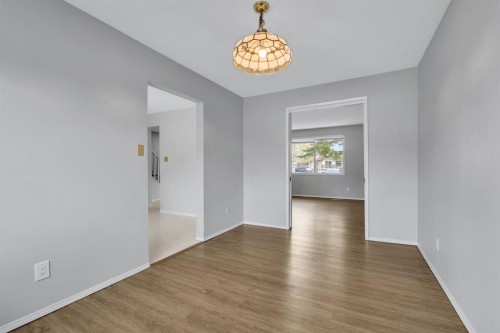 57 & 59 Dalton Bay Nw, Calgary, AB - Indoor Photo Showing Other Room