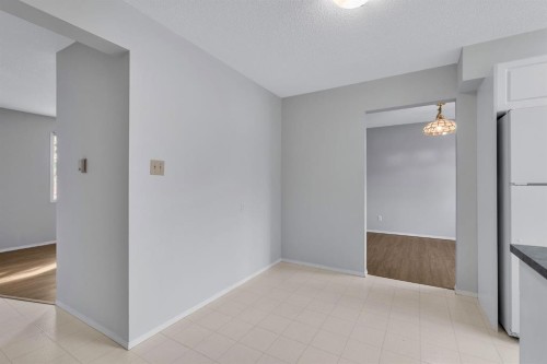 57 & 59 Dalton Bay Nw, Calgary, AB - Indoor Photo Showing Other Room
