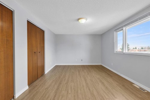57 & 59 Dalton Bay Nw, Calgary, AB - Indoor Photo Showing Other Room