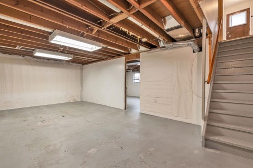 57 & 59 Dalton Bay Nw, Calgary, AB - Indoor Photo Showing Basement