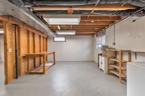 57 & 59 Dalton Bay Nw, Calgary, AB - Indoor Photo Showing Basement