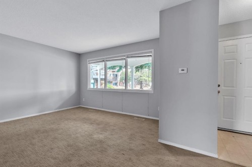 57 & 59 Dalton Bay Nw, Calgary, AB - Indoor Photo Showing Other Room