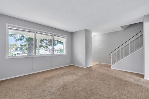 57 & 59 Dalton Bay Nw, Calgary, AB - Indoor Photo Showing Other Room