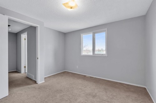 57 & 59 Dalton Bay Nw, Calgary, AB - Indoor Photo Showing Other Room