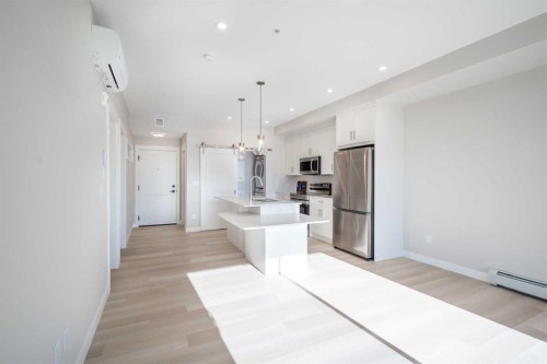 7202-1802 Mahogany Boulevard Se, Calgary, AB - Indoor Photo Showing Kitchen