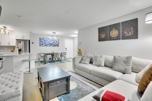 1111-2280 68 Street Ne, Calgary, AB - Indoor Photo Showing Living Room