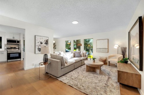 212 Midlawn Close Se, Calgary, AB - Indoor Photo Showing Living Room