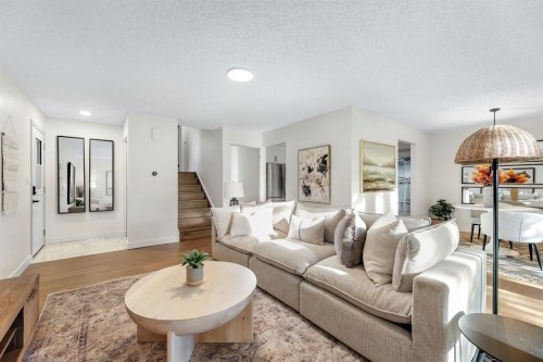 212 Midlawn Close Se, Calgary, AB - Indoor Photo Showing Living Room