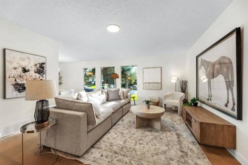 212 Midlawn Close Se, Calgary, AB - Indoor Photo Showing Living Room