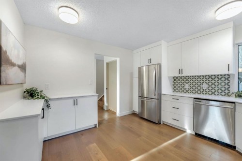 212 Midlawn Close Se, Calgary, AB - Indoor Photo Showing Kitchen With Stainless Steel Kitchen