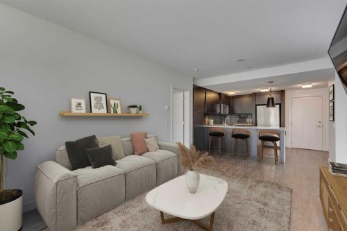 107-25 Aspenmont Heights Sw, Calgary, AB - Indoor Photo Showing Living Room