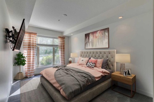 107-25 Aspenmont Heights Sw, Calgary, AB - Indoor Photo Showing Bedroom
