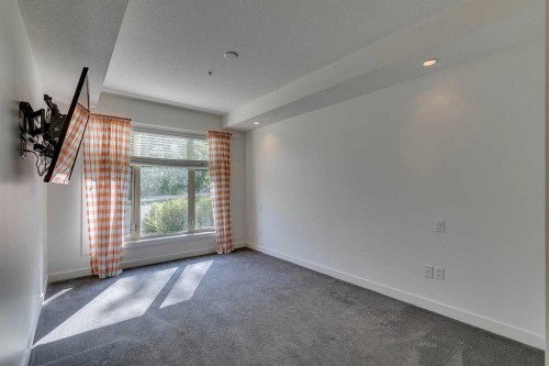 107-25 Aspenmont Heights Sw, Calgary, AB - Indoor Photo Showing Other Room