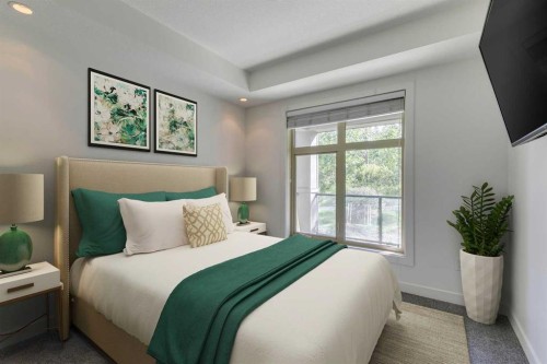 107-25 Aspenmont Heights Sw, Calgary, AB - Indoor Photo Showing Bedroom