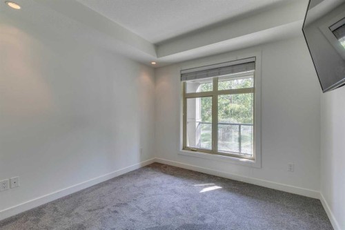 107-25 Aspenmont Heights Sw, Calgary, AB - Indoor Photo Showing Other Room