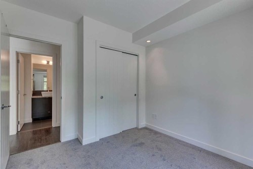 107-25 Aspenmont Heights Sw, Calgary, AB - Indoor Photo Showing Other Room