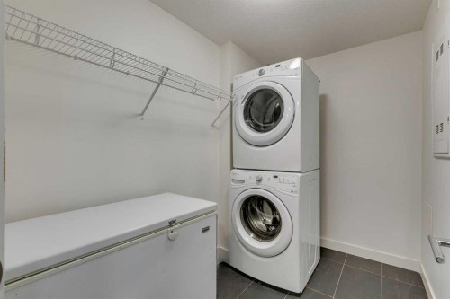 107-25 Aspenmont Heights Sw, Calgary, AB - Indoor Photo Showing Laundry Room