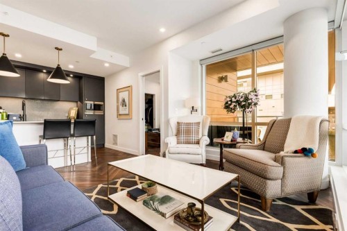 601-8445 Broadcast Avenue Sw, Calgary, AB - Indoor Photo Showing Living Room