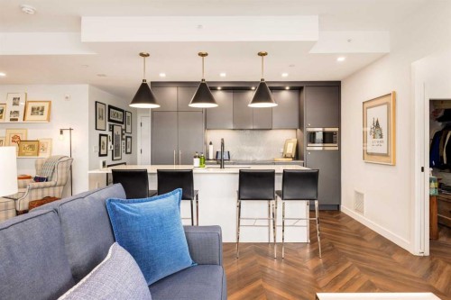 601-8445 Broadcast Avenue Sw, Calgary, AB - Indoor Photo Showing Kitchen With Upgraded Kitchen