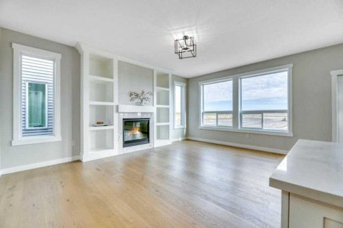 828 Edgefield Street, Strathmore, AB - Indoor Photo Showing Living Room With Fireplace