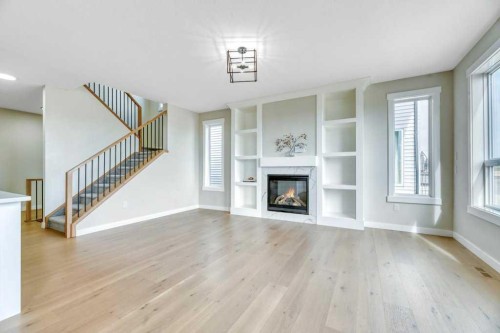 828 Edgefield Street, Strathmore, AB - Indoor Photo Showing Living Room With Fireplace