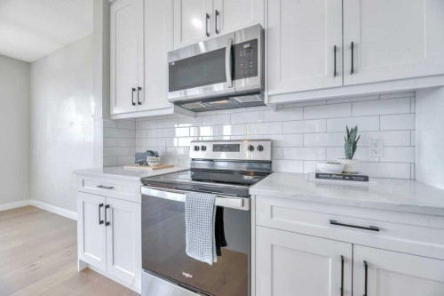828 Edgefield Street, Strathmore, AB - Indoor Photo Showing Kitchen With Upgraded Kitchen