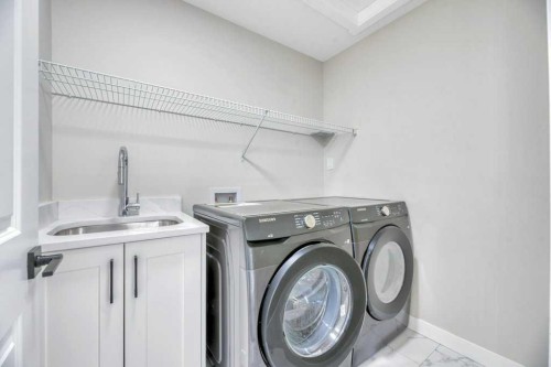 828 Edgefield Street, Strathmore, AB - Indoor Photo Showing Laundry Room