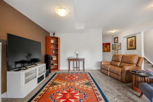 2253 Bayside Road Sw, Airdrie, AB - Indoor Photo Showing Living Room