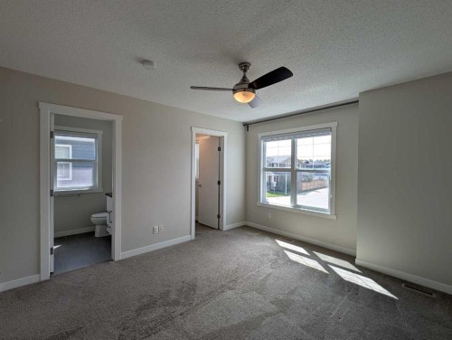 290 Fireside Drive, Cochrane, AB - Indoor Photo Showing Other Room