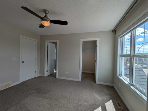 290 Fireside Drive, Cochrane, AB - Indoor Photo Showing Other Room