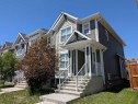 290 Fireside Drive, Cochrane, AB  - Outdoor With Facade 
