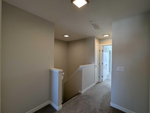 290 Fireside Drive, Cochrane, AB - Indoor Photo Showing Other Room